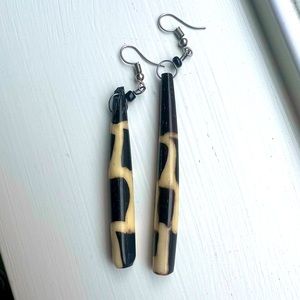 Camel bone hand carved and painted earrings from Kenya.